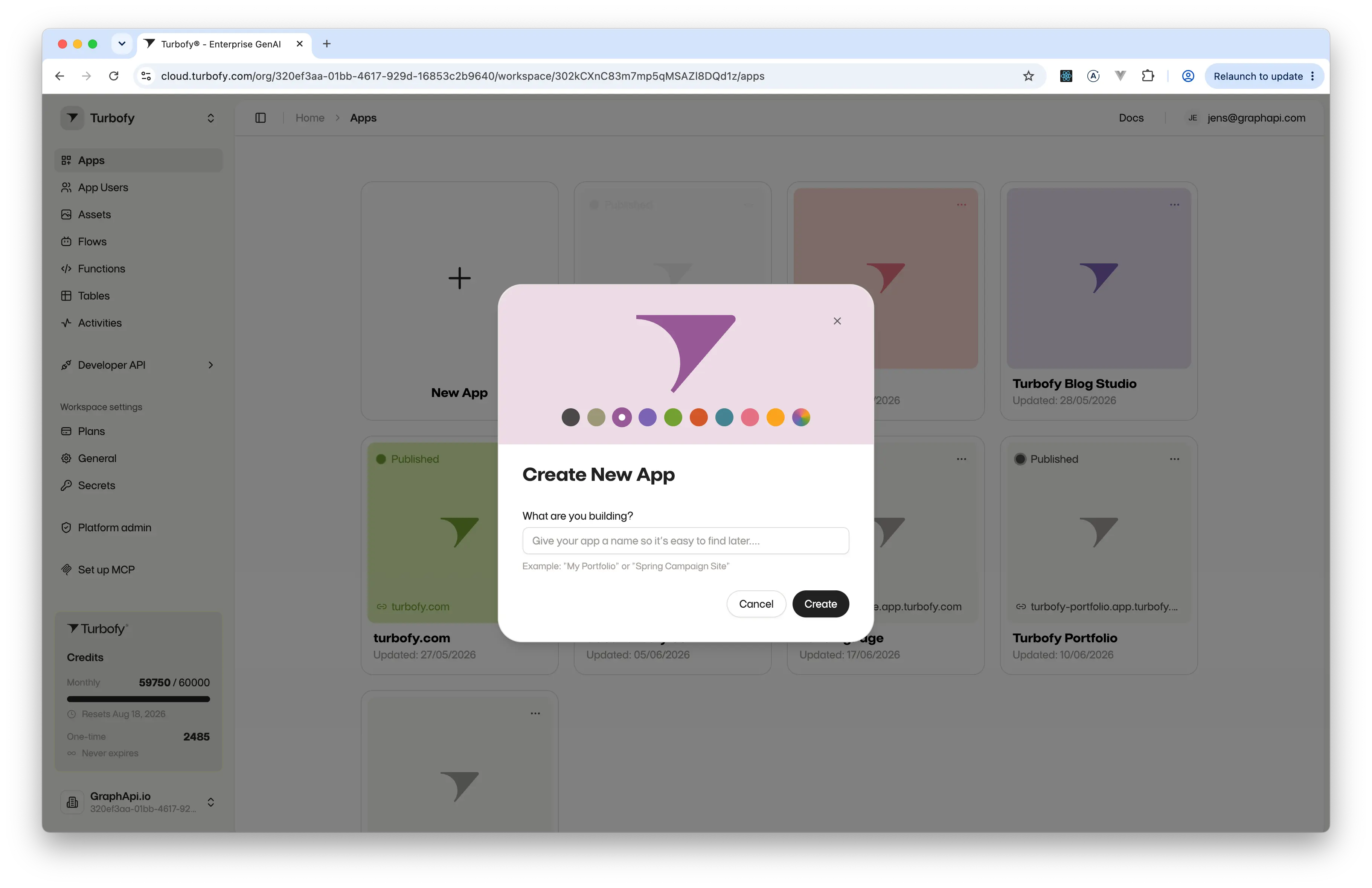 The Apps screen with a grid of app cards behind the Create New App dialog, which offers a name field and a row of accent colour swatches